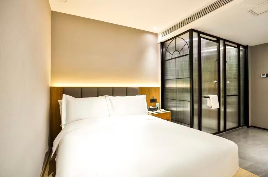 True Go Hotel - Shanghai Jing'An Temple Nanjing West Road Buitenkant foto