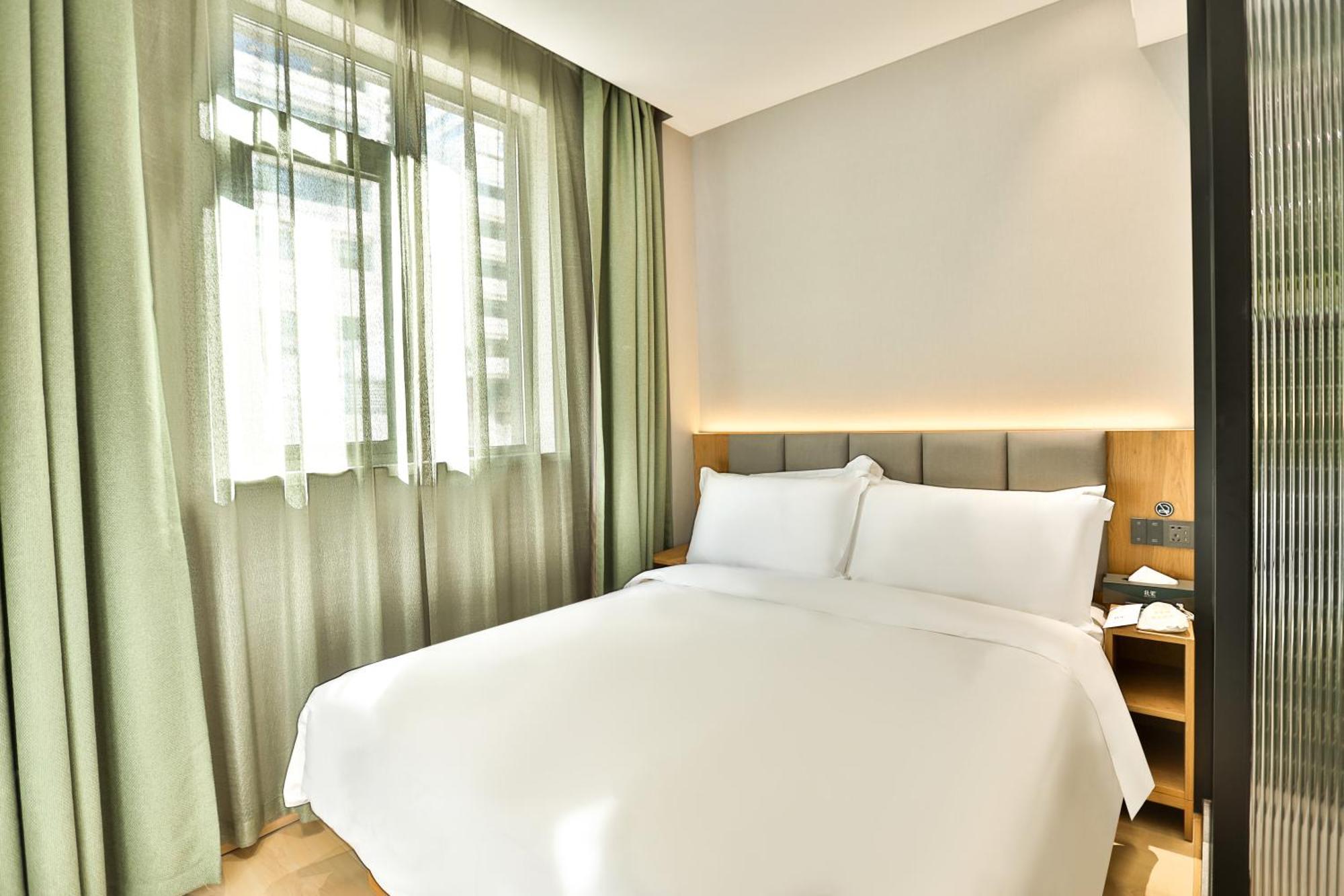 True Go Hotel - Shanghai Jing'An Temple Nanjing West Road Buitenkant foto